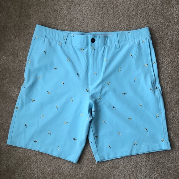 Under Armour Men’s 38 Golf Printed Storm Shorts in Light Blue w/Yellow Birds - Picture 1 of 14